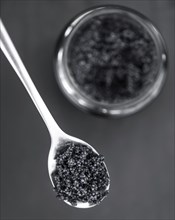 Portion of fresh Black Caviar (selective focus, close-up shot)