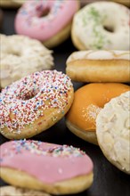 Fresh made Donuts as detailed close-up shots (selective focus)