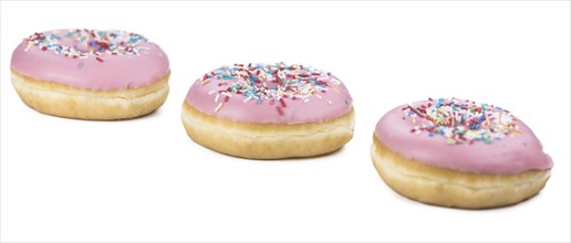 Fresh made Donuts isolated on white background (selective focus)