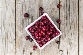 Portion of Preserved Cranberries as detailed close-up shot, selective focus