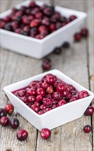 Portion of Preserved Cranberries as detailed close-up shot, selective focus