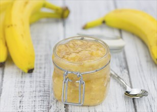 Banana Mash (close-up shot) on a vintage wooden table (selective focus)