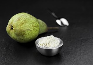 Portion of Pear powder as detailed close-up shot, selective focus