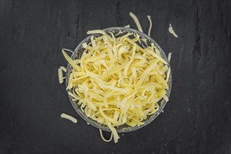 Fresh made Grated Cheese as detailed close-up shot