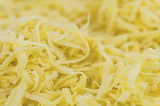 Fresh made Grated Cheese as detailed close-up shot