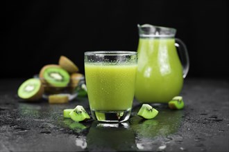 Fresh made Kiwi Smoothie (selective focus) on a vintage looking background