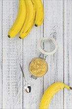 Mashed Bananas on a vintage background as detailed close-up shot (selective focus)