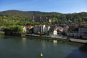 View from the Old Bridge to the Old Town of Heidelberg behind the castle ruins, Heidelberg,