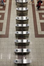 Row of modern ticket readers at Syntagma metro station, view from above, Athens, Greece, Europe