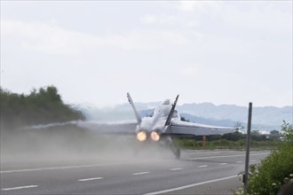 Swiss Air Force F/A 18 fighter aircraft take off and land on the A1 motorway during the Alpha Uno