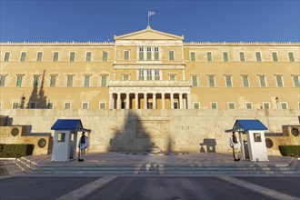 Parliament building with evzones in the evening light, former royal palace, Syntagma Square,