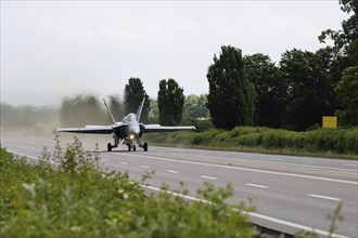 Swiss Air Force F/A 18 fighter aircraft take off and land on the A1 motorway during the Alpha Uno