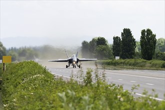 Swiss Air Force F/A 18 fighter aircraft take off and land on the A1 motorway during the Alpha Uno