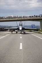 Swiss Air Force F/A 18 fighter aircraft take off and land on the A1 motorway during the Alpha Uno