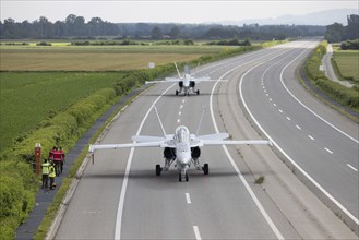 Swiss Air Force F/A 18 fighter aircraft take off and land on the A1 motorway during the Alpha Uno