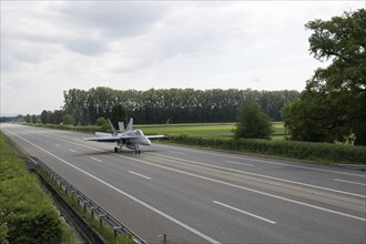 Swiss Air Force F/A 18 fighter aircraft take off and land on the A1 motorway during the Alpha Uno