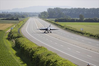 Swiss Air Force F/A 18 fighter aircraft take off and land on the A1 motorway during the Alpha Uno