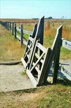 Self-closing gate in the fence at Backakra, the holiday home, now museum, of the Swedish diplomat