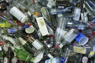 Waste glass, glass waste in a waste paper basket, Germany, Europe