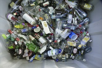 Waste glass, glass waste in a waste paper basket, Germany, Europe