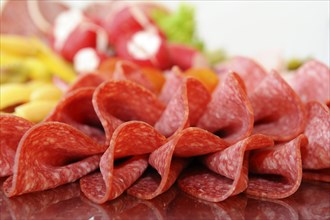 Close-up of several slices of salami on a buffet, Bavaria