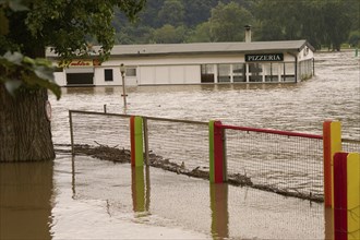 The pizzeria of a campsite is flooded by the high water of the Rhine. The Rhine levels continue to