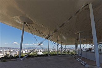 Viewing terrace with floating flat roof, view of landscape park and Athens, cultural centre of the