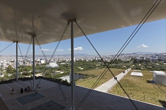 Viewing terrace with floating flat roof, view of landscape park and Athens, cultural centre of the