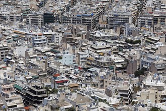 View of densely built-up metropolis, sea of houses without greenery, symbolic image concrete