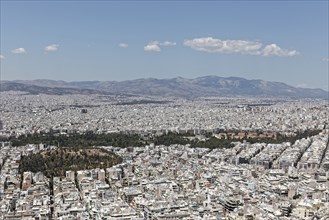 City centre and Mount Hymettos, view from Lycabettus Hill, Lykavittos, sea of houses with little