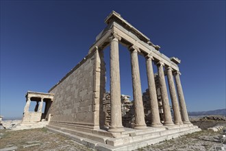 Erechteion east facade, blue sky, temple in Doric architectural style, Acropolis, Athens, Greece,