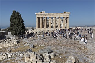 View of Parthenon Temple and first tourists in the morning, Acropolis, Athens, Greece, Europe