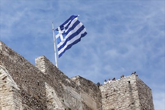 Greek national flag on the walls of the Acropolis, Athens, Greece, Europe