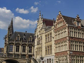 A series of historic buildings with detailed facades and different architectural styles, Ghent,