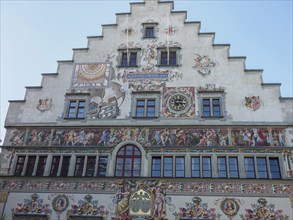 Historic building with ornate frescoes and detailed paintings on the faÃ§ade, Lindau, Bavaria,