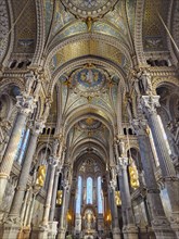 Notre Dame de Fourviere in Lyon, France. Indoors view of basilica altar in Neo-Byzantine