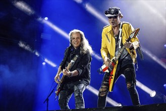 Bass player Pawel Maciwoda and guitarist Rudolf Schenker from the band Scorpions at the Wacken Open