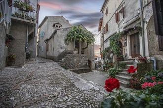 Old, historic, dreamy mountain village. Narrow streets, old houses in a romantic setting.