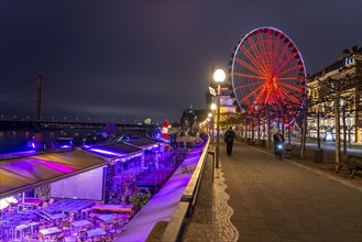 Old town, closed gastronomy on the banks of the Rhine, Ferris wheel, Wheel of Vision, with many