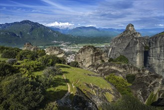 View from the Meteora rocks over the village Kalambaka in the valley to the mountains and