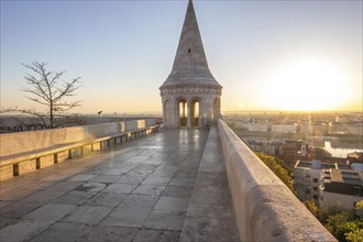 Old historic fortress and church at sunrise. City panorama at dusk. View of the Danube Fishermen's