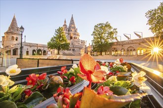 Old historic fortress and church at sunrise. City panorama at dusk. View of the Danube Fishermen's