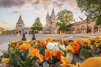 Old historic fortress and church at sunrise. City panorama at dusk. View of the Danube Fishermen's