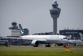 Cathay Pacific aircraft at Amsterdam Schiphol Airport, on the taxiway for take-off on the