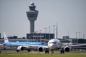 Aircraft at Amsterdam Schiphol Airport, on the taxiway for take-off on the Aalsmeerbaan, 18L/36R,