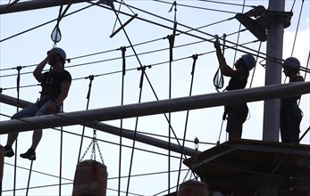 Berlin, 31.07.2010, Climbers in the high ropes course Mount Mitte, Berlin, Germany, Europe