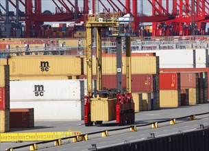 Bremerhaven, 29.09.2010, Van Carrier transports containers at the Eurogate container terminal,