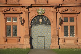 Red portal with coat of arms, door with fittings and decorations, baroque, red, Electoral Palace,