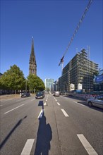 Willy-Brandt-Strasse with the memorial of the former main church St. Nikolai and construction site