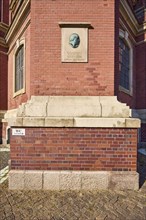 Facade with memorial plaque to Ernst Georg Sonnin, the builder of the main church of St Michaelis,